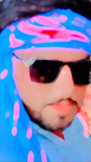 Exploring Traditional Blue Garment with Red Patterns