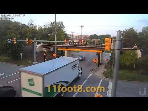 Rental truck crash debris hits innocent vehicle at the 11foot8+8 bridge