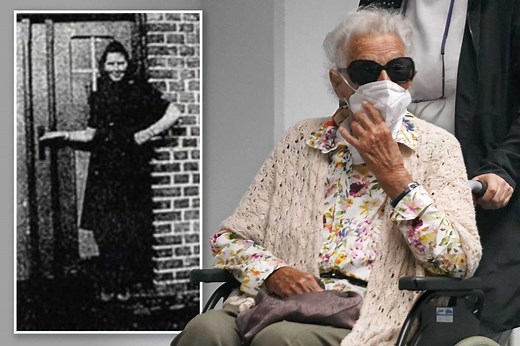 Former SS guard Josef Schuetz, age 101, hid his face when sentenced for the murder of more than 3,500 Jews and others