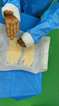 GOWNING AND OPEN GLOVING TECHNIQUE