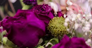 A combined bouquet of different types of flowers in close-up, beautiful dried flowers in a gift bouquet