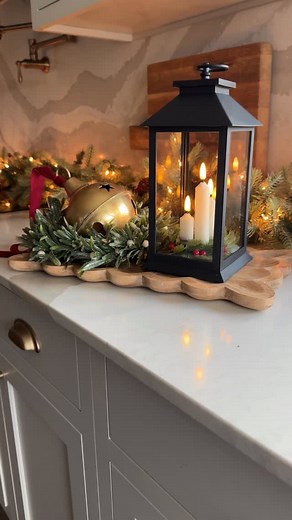 ✨ A little tray magic ✨ I lined the countertops with our Warm Glow Garland, and now the whole kitchen feels warm and cozy. This tray is filled with cute pieces from Interior Delights that make your space feel welcoming and full of intention. Because beauty belongs in the everyday moments too. ✨ Comment CLASSIC to shop the collection! 🤍 https://www.interiordelights.net/products/antique-lantern-with-3-candles #WarmGlowGarland #InteriorDelights #CozyKitchen #HomeStyling #IntentionalLiving #Holiday