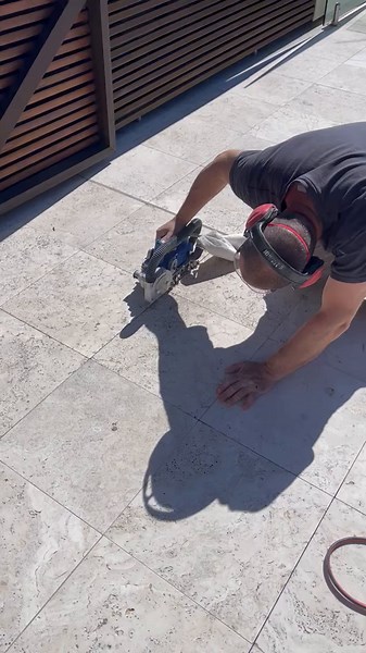 Grout Buster 3000 – an innovative grout removal machine designed for precise and efficient grout extraction. Equipped with unique locating wheels, it locks securely in place and glides smoothly along the grout line, ensuring stability without shifting. Simply push forward or pull back to operate, and adjust the blade depth to match your tile's thickness. This machine makes grout removal quick and easy, eliminating the need for multitools or grinders. Credit to : chios building services #GroutBus