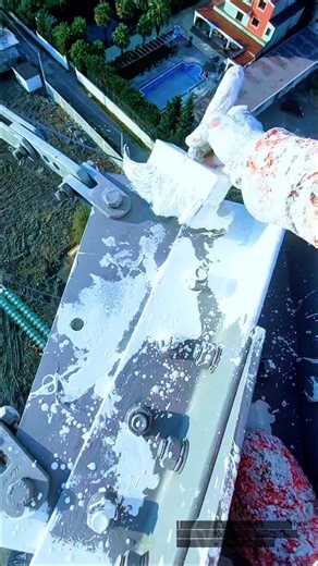 High-Altitude Painting on Transmission Tower — Structural Maintenance Work