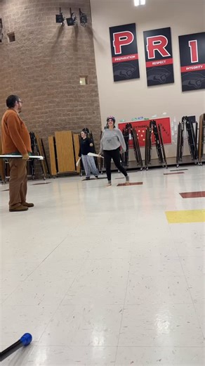 She went from “I want to be featured on rifle” to “No, my mom said I’m not allowed to do that,” which was a joke because her mom had no idea what was happening at practice. It took some time, some inspirational team singing of “Let It Go” but she eventually got it! She then took off the helmet and kept going. Woo hoo! #winterguard #winterguardriflework #learningnewrifletricks #letitgo #oakharborwinterguard | Oak Harbor High School Color Guard