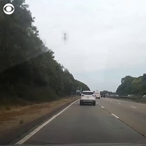 This driver in Essex, England collided with a police car on the road before driving for three miles in the wrong direction, crashing his car, and fleeing on foot, according to a police report. | CBS News