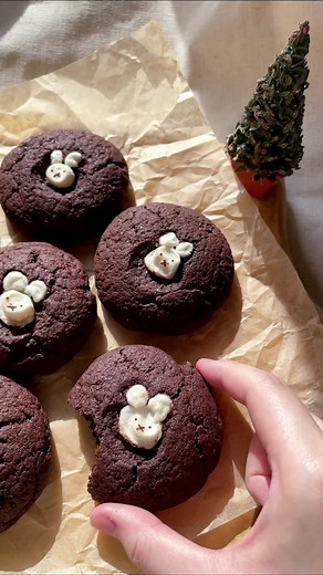 chocolate miffy cookies 🐇🎄 starting christmas early with laufey’s new christmas songs hehe!!! ingredients: - 1 stick butter - 1/2 cup sugar - 1 tsp vanilla - 1 egg - 1 cup flour - 6 tbsps cocoa powder - 1/2 tsp baking soda - 1/4 tsp salt recipe: 1. mix butter and sugar 2. add vanilla extract and egg, and mix 3. in another bowl, mix flour, cocoa powder, baking soda, and salt 4. add dry ingredients to wet ingredients, and mix 5. add cookie dough to baking sheet 6. (optional: use marshmallows to 