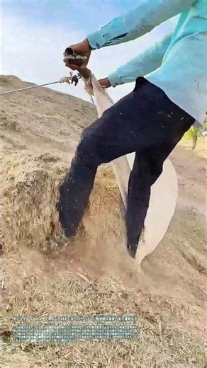 布とワイヤーウインチで飼料山を斜面上部へ引き上げる：農地飼料保管の省力運搬手法