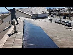 How to Clean Solar Panels With A Waterfed Brush the Easy Way