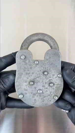 Inside view of the mechanism in a large old padlock