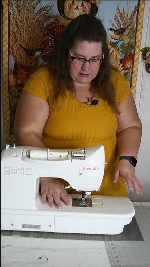 How to lower feed dogs on a Singer Sewing Machine