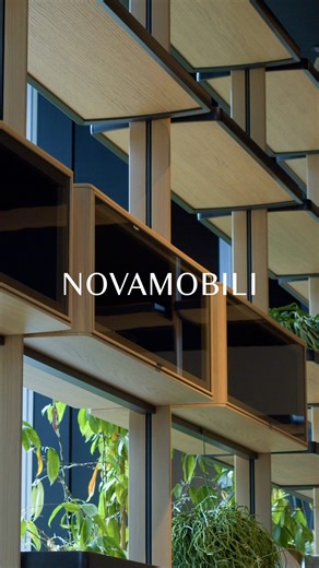 Novamobili on Instagram: "In the living area, the Dedalo upright system interprets the wall system with fluid modularity, integrating functions and textures into a continuous, fully customised architectural presence."