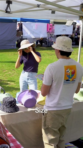 As an introvert, selling bucket hats in public is terrifying…
