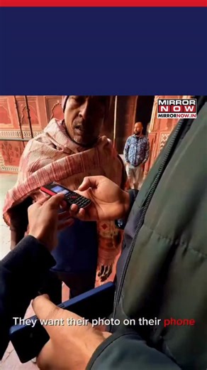Mirror Now on Instagram: "🎥-@ya_muzzz The video shows the couple asking a passerby to take their picture at the Taj Mahal using a basic keypad phone, drawing attention to how simple moments still matter more than picture quality. #tntrending"