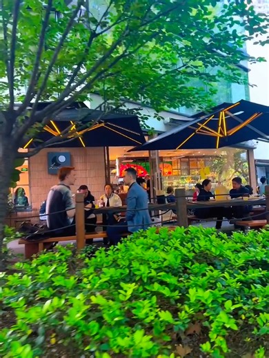 Isn't it just the best to stroll through downtown #Shanghai in early summer 🌞? The streets lined with lush plane trees create a tranquil oasis 🍃. #ShanghaiSummer #UrbanOasis #UrbanLandscape #CityScape | Shanghai Let's meet