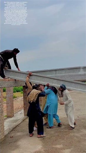 Steinpfeiler auf Mauer setzen: Wie Teamarbeit alte Bautechniken neu belebt