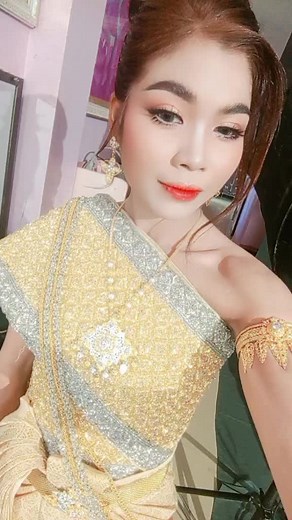 Traditional Attire Showcase: Elegant Yellow and Silver Dress