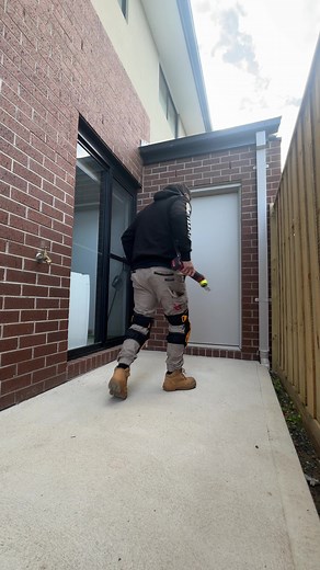 Caulking Expansion Joints for Concrete Path and Brick Wall