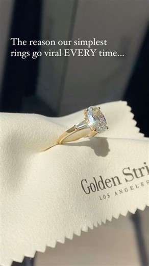 Golden String Inc on Instagram: "Our simplest settings go viral EVERY time… and there’s a good reason✨ People love to have the versatility to mix and match wedding bands + stackables down the line. Classic settings give that option - while more specific styles generally need a matched band. They also love the minimal look of the setting with a large center diamond 😉 it doesn’t go out of style or need to be reset down the line 💍 •3ct Oval Cut Diamond on our Tapered Baguette Setting 💎 #spaceddi