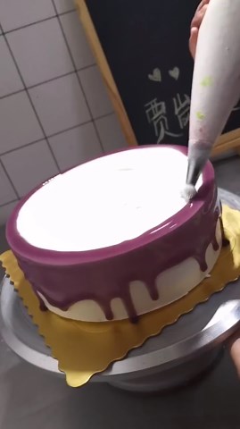 Making Purple Design With Fruity Toppings Icing Cake
