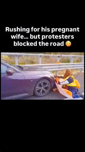 Viral hai Bhai 🔵 on Instagram: "Man Rushes Pregnant Wife to Hospital—But Protesters Block the Road and Chaos Erupts 😳🚧 A husband racing against time to save his pregnant wife is stopped in the middle of the highway by climate protesters — turning a family emergency into a frightening standoff. 1. The video shows a man jumping out of his car, panicked and begging protesters to move. 2. His pregnant wife is reportedly in medical distress and needs urgent hospital care. 3. Protesters are sitting