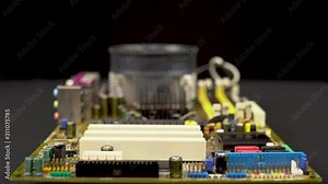 Removing a network card from the motherboard. Network data transmission system via wire. Many different chips. View of the computer parsed