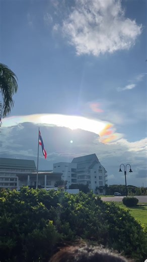 Stunning Rainbow Cloud Formation in Vibrant Sky