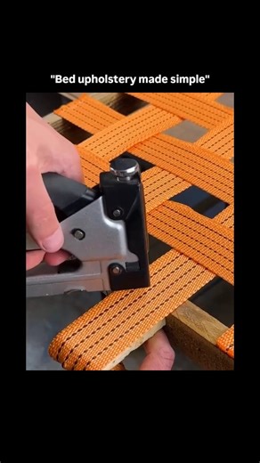 Knowledge | Curiosity | Discovery on Instagram: "This footage documents the manual refurbishment of a furniture support structure, specifically demonstrating the installation of high-tensile orange nylon webbing to create a resilient load-bearing lattice. The visual narrative details the precise tensioning and securing process, where the synthetic strap is anchored to the wooden frame using a heavy-duty stapler, followed by the application of localized heat to cauterize the severed edges and pre