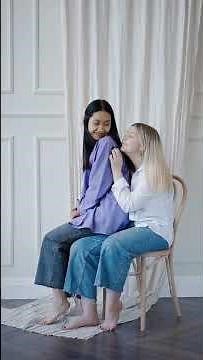 Woman Sitting on a Person's Lap