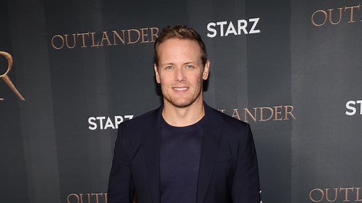 ‘Outlander’ Star Sam Heughan Responds to Monika Clarke Kissing Pics