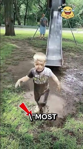 Little Kid Gets a Free Mud Bath on the Slide