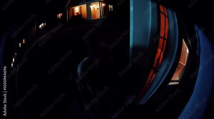 security camera image with a fisheye lens perspective shows zombies approaching the front door.