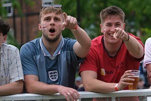 Gallery shows England fans cheering the Three Lions on against Denmark