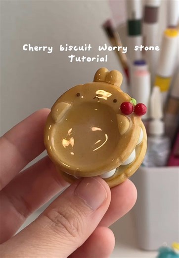 Some of you asked for a tutorial on my cherry biscuit bunny worry stone!🍒 I’m not the best at tutorials but I tried to fit the process in here! Worry stones are small pieces you can hold and rub your thumb over for fidgeting or something calming in your hands. I didn’t include the resin step since the video would’ve been too long, but let me know if you’d like to see that too! Thank you guys so much for all the love on these lately 🥹 If there’s anything else you’d want a tutorial on please lmk