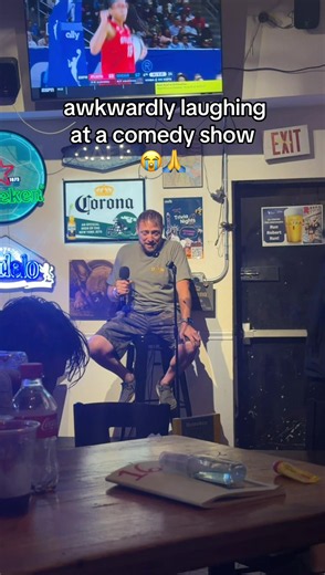 Awkwardly Laughing at a Comedy Show — Genuine Reactions