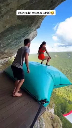 JEE Master on Instagram: "Cliff Airbag is wild! 😱🔥Guy jumps, girl flies! #ScaryRide #TravelWonder #adventureenthusiasts"