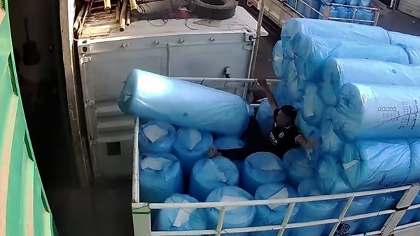 Employee falls into foam pile while unloading truck in Sidoarjo