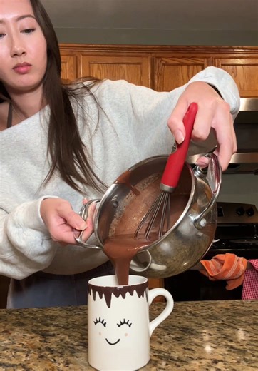 Tutorial on how to make the world’s THICKEST hot chocolate 😆 I can’t believe it HAHAHHA I think I kept it on the stove too long? Next time we’re ditching the heavy cream #homemadehotchocolate #hotchocolaterecipe #thickhotchocolate #richhotchocolate