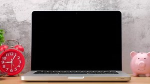 clip-1028060876-modern-laptop-computer-empty-screen-on-office