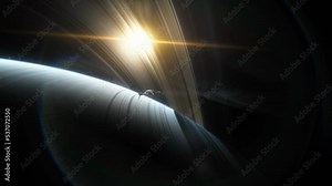 Spaceship flies over the atmosphere of the planet Saturn, the sun shines through the rings. Planet Saturn is a huge planet of the solar system with beautiful rings. Asteroid field near the planet