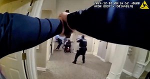 Video shows chainsaw-wielding man shot by police in Illinois