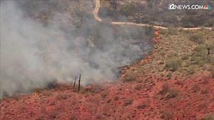 7.3K views · 136 reactions | WATCH: An air tanker drops fire retardant over the East Desert Fire in north Phoenix. The wildfire has burned more than 1,500 acres of land and forced the evacuation of 130 homes in north Phoenix. Get the latest updates at: bit.ly/2X5AdKp | 12News | Facebook