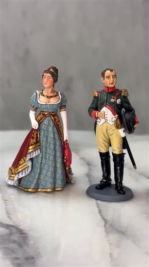 Breagans on Instagram: "🇫🇷 Napoleon and Josephine ❤️ Model: NA414 Scale: 1/30 Finish: Matte This elegant two-figure set captures the Emperor Napoleon Bonaparte alongside his beloved first wife, Empress Josephine. Napoleon is shown wearing the distinctive uniform of a Colonel of the Chasseurs à Cheval of the Imperial Guard, a tribute to the elite cavalry unit that so often served as his personal escort. Beside him stands Josephine, regally attired in a pale blue Empire-style gown richly embroid