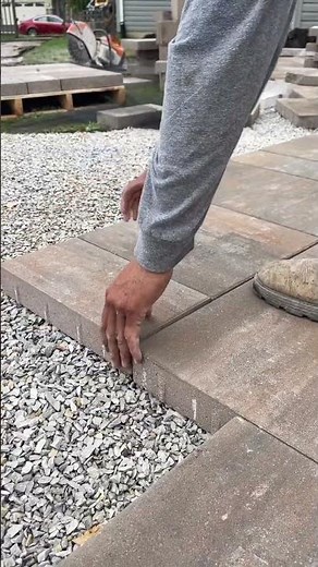 How to install pavers ✅#unilock #construction #outdoorliving #patio #outdoorspace #patioliving