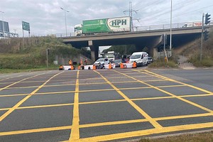 Dozens arrested as protesters cause major delays by blocking M25 junctions