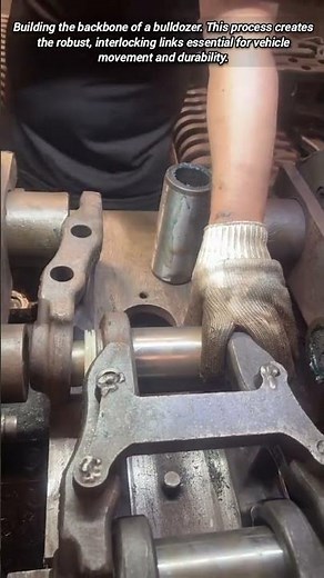 Pressing Pins into Excavator Track Links with Industrial Power.