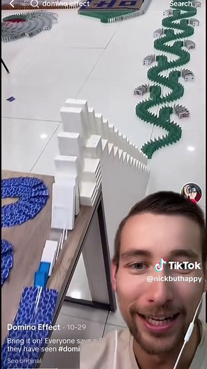 The Satisfying Domino Effect: Watch Dominos Fall