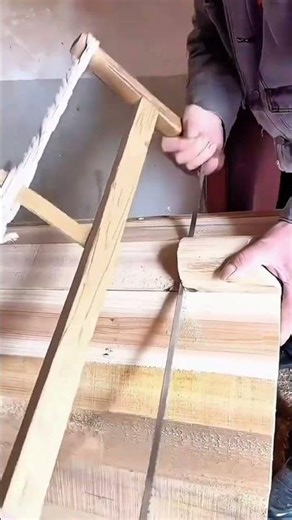 Precision wood splitting technique using hammer and chisel on thick block
