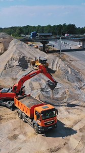 Download Highway road under construction. Aerial view on the new road construction site Vertical for free