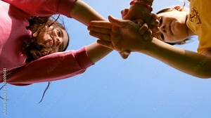 Children put their hands together friendship. Selective focus.